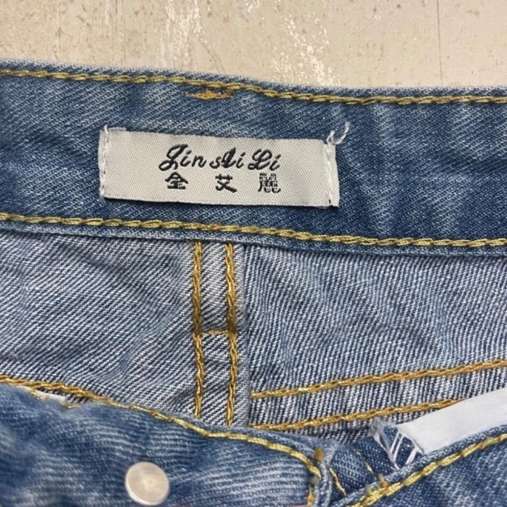 Jin Ai Li Ladies Distressed Denim Mini Skirt; Blue; Size XS/S‎